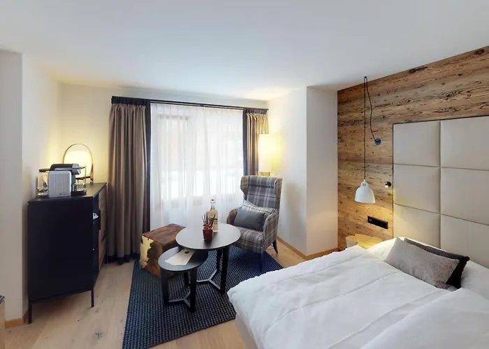 ホテル Walliserhof Grand-hotel & Relais & Chateaux 5*